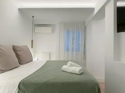 Cama o camas de una habitación en Habitación Puerta del Sol A