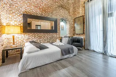 Cama o camas de una habitación en Bonito estudio Palacio Real