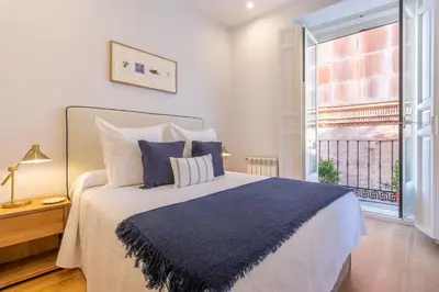 Cama o camas de una habitación en Charming Apartment in the Heart of Las Letras