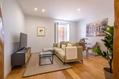 Una televisión o centro de entretenimiento en Elegant Apartment in Las Letras