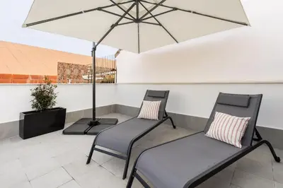 Zona de estar de Charming Attic with Terrace in Las Letras