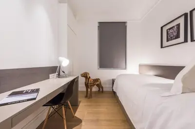 Cama o camas de una habitación en Spectacular 3-Bed Apartment in Central Madrid