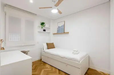 Cama o camas de una habitación en Nova City Apartment - Next to Atocha Station