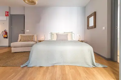 Cama o camas de una habitación en Heima Madrid en las Letras. Alquiler temporal