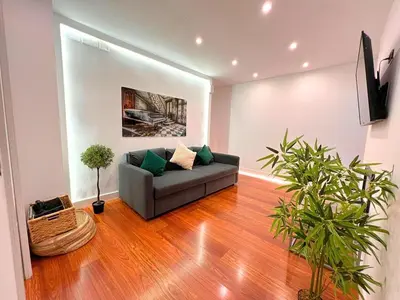 Una televisión o centro de entretenimiento en Enorme ! Salamanca 3 bedrooms 2 bathrooms