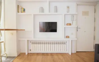 Una televisión o centro de entretenimiento en Apartamento céntrico en Chueca