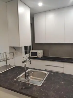 Una cocina o zona de cocina en Argüelles