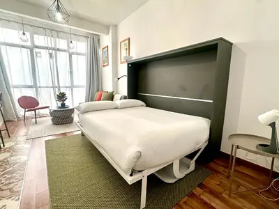 Cama o camas de una habitación en Sweet Spot steps from Gran Vía