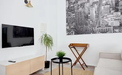 Una televisión o centro de entretenimiento en Apartamento en Las Ventas