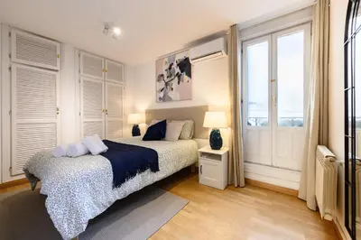 Cama o camas de una habitación en FER55D - Amplio piso 3 dormitorios en Moncloa, Madrid - Alquiler temporal