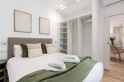 Cama o camas de una habitación en Waou El Rastro II - Alquiler Corta Duración