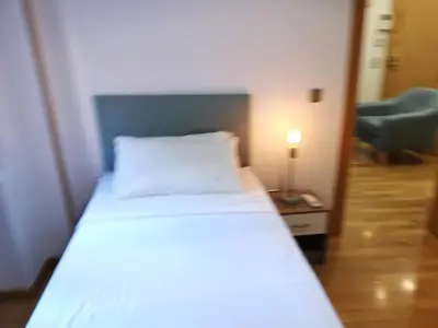 Cama o camas de una habitación en Amplio apartamento situado a 10 minutos del Retiro