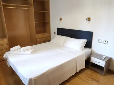 Cama o camas de una habitación en Amplio apartamento situado a 10 minutos del Retiro