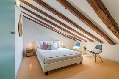 Cama o camas de una habitación en Heima buhardilla de ensueño 4 D. Alquiler temporal