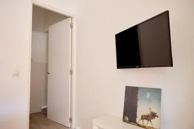 Una televisión o centro de entretenimiento en Apartamento en zona de Comillas, Madrid