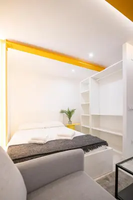 Cama o camas de una habitación en Coqueto apartamento a 1km Puerta del Sol izq