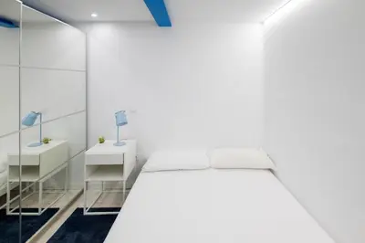 Cama o camas de una habitación en A charming apartment 1 km from Puerta del Sol dcha