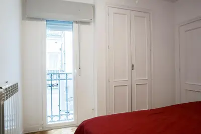 Cama o camas de una habitación en Madrid City Center with Garage 3 bedrooms 2 baths