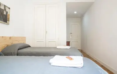 Cama o camas de una habitación en Madrid City Center with Garage 3 bedrooms 2 baths