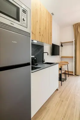Una cocina o zona de cocina en The Madrid Studios by Charming