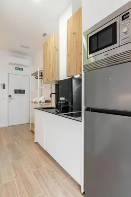 Una cocina o zona de cocina en The Madrid Studios by Charming