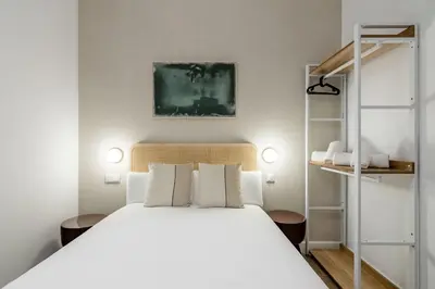 Cama o camas de una habitación en The Madrid Studios by Charming