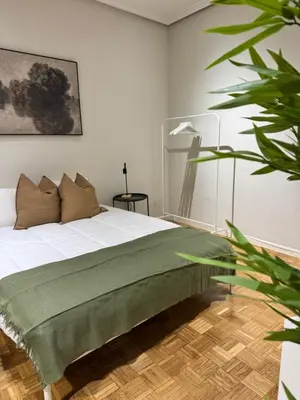Cama o camas de una habitación en Exyca Homes Chamberi