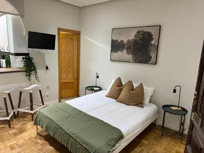 Cama o camas de una habitación en Exyca Homes Chamberi
