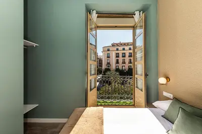 Cama o camas de una habitación en Queen's Puerta del Sol Boutique I - Alojamiento Corta Estancia