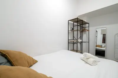 Cama o camas de una habitación en QGZ16 Piso 2 Dormitorios Chamberí Moncloa
