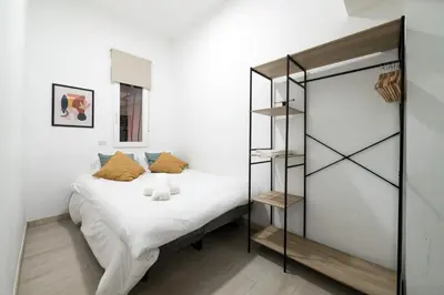 Cama o camas de una habitación en QGZ16 Piso 2 Dormitorios Chamberí Moncloa