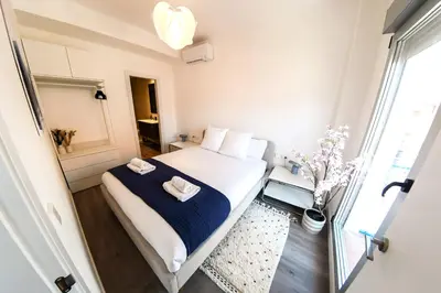 Cama o camas de una habitación en Contemporary chic Sun-Drenched Oasis with Terrace