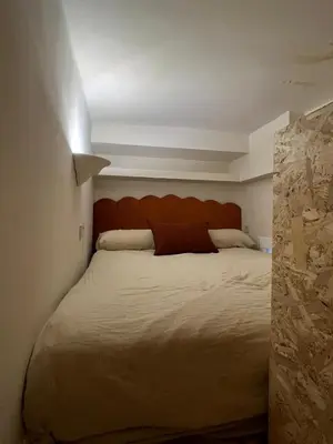 Cama o camas de una habitación en Exyca Chamberí