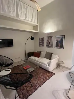 Zona de estar de Exyca Chamberí