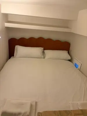 Cama o camas de una habitación en Exyca Chamberí