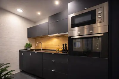 Una cocina o zona de cocina en Toro Almudena Suites