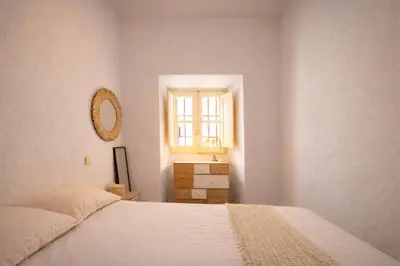 Cama o camas de una habitación en Toro Almudena Suites