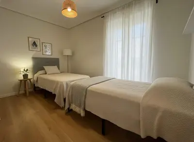 Cama o camas de una habitación en Urban Arniches, junto a Plaza Mayor