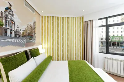 Cama o camas de una habitación en Grupotel Mayorazgo