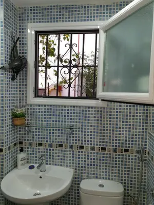 Un baño de CENTRO MADRID, Las Letras