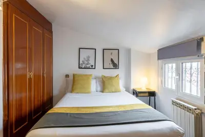 Cama o camas de una habitación en Smartr Madrid Chueca