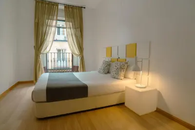 Cama o camas de una habitación en Smartr Madrid Chueca