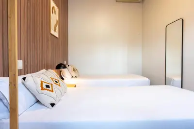 Cama o camas de una habitación en Smartr Madrid Chueca