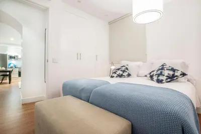 Cama o camas de una habitación en Slow Suites Augusto