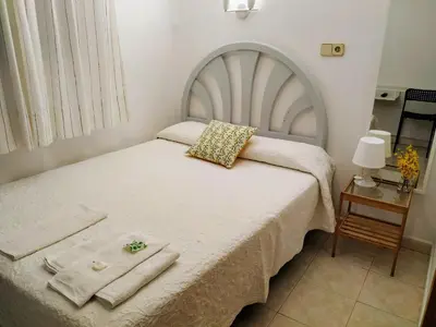 Cama o camas de una habitación en Hostal Abitum Madrid