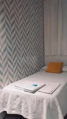 Cama o camas de una habitación en Hostal Abitum Madrid
