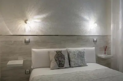 Cama o camas de una habitación en Hostal Met Madrid