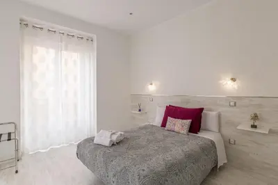 Cama o camas de una habitación en Hostal Met Madrid