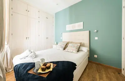 Cama o camas de una habitación en Gran Via I Santa Ana