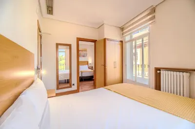 Cama o camas de una habitación en ITC Mora by Soho Boutique